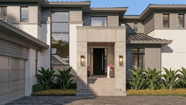 property entrance with a standing seam roof, brick siding, and metal roof