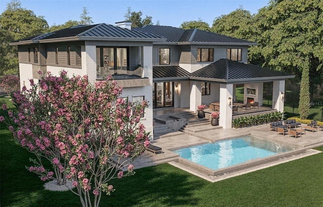 back of house featuring french doors, brick siding, a standing seam roof, a patio area, and metal roof