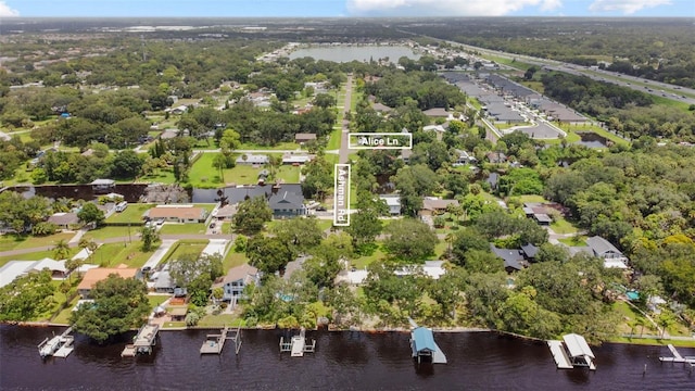 aerial view with a residential view and a water view