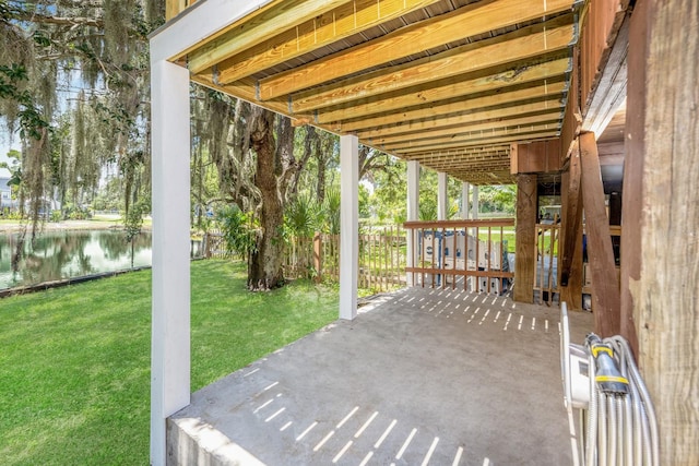 view of patio featuring a water view