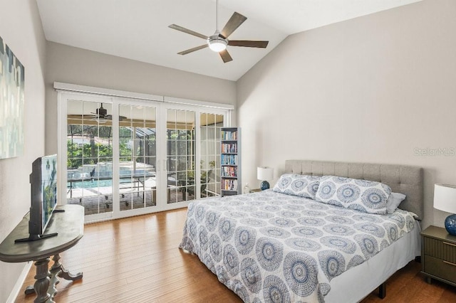 bedroom featuring lofted ceiling, access to exterior, a ceiling fan, and wood finished floors