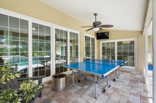 view of patio with ceiling fan and outdoor dining space