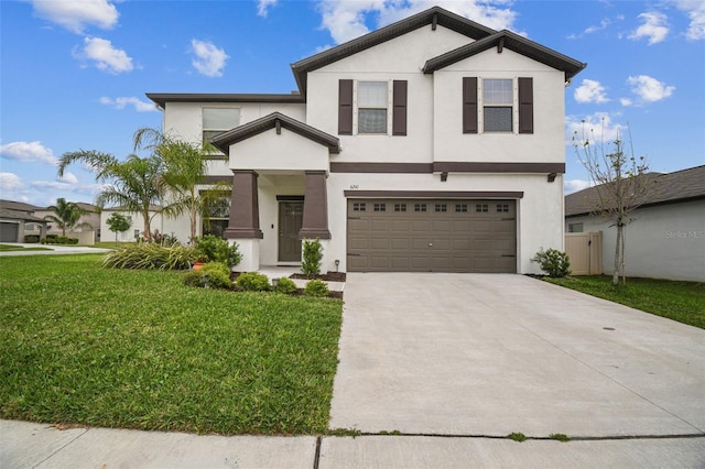 view of front of house with a garage, concrete driveway, a front lawn, and stucco siding