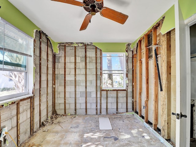 interior space featuring a ceiling fan