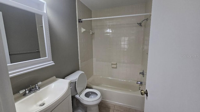 full bathroom with vanity, bathing tub / shower combination, tile patterned flooring, and toilet