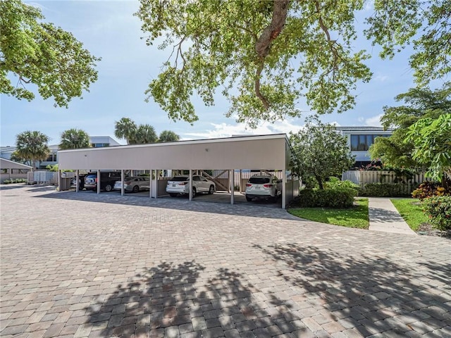 covered parking lot with fence