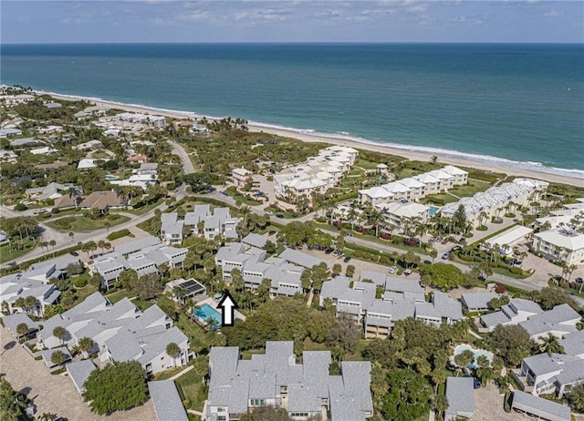 bird's eye view with a residential view and a water view