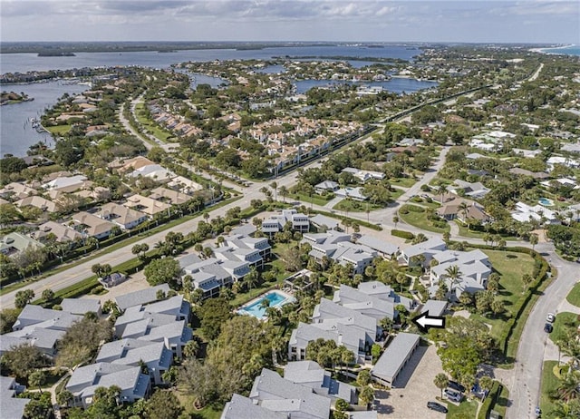 aerial view with a water view and a residential view