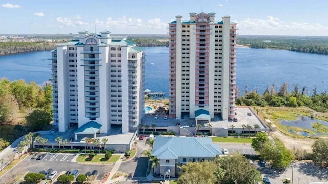 birds eye view of property featuring a water view