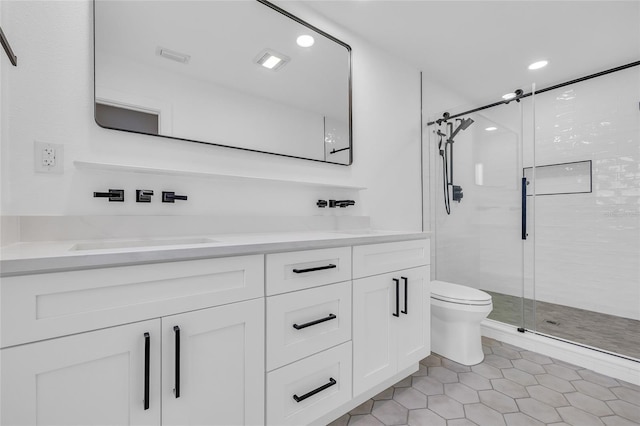 1842 Oklahoma Ave NE, Saint Petersburg, FL 33703 - bathroom with tile patterned floors, toilet, recessed lighting, a shower stall, and vanity