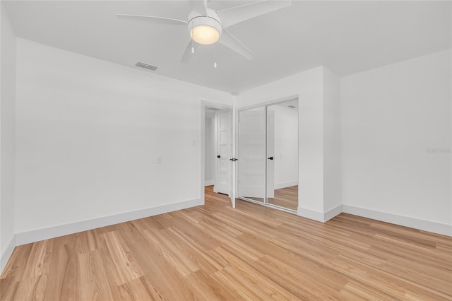 1842 Oklahoma Ave NE, Saint Petersburg, FL 33703 - unfurnished bedroom with visible vents, ceiling fan, baseboards, light wood-style floors, and a closet