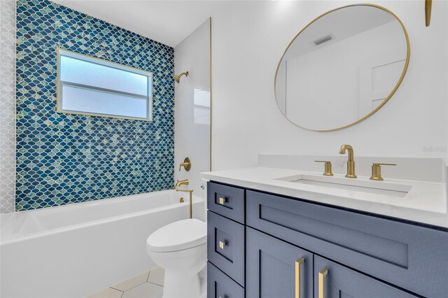 1842 Oklahoma Ave NE, Saint Petersburg, FL 33703 - full bathroom featuring visible vents, toilet, tile patterned flooring, bathtub / shower combination, and vanity
