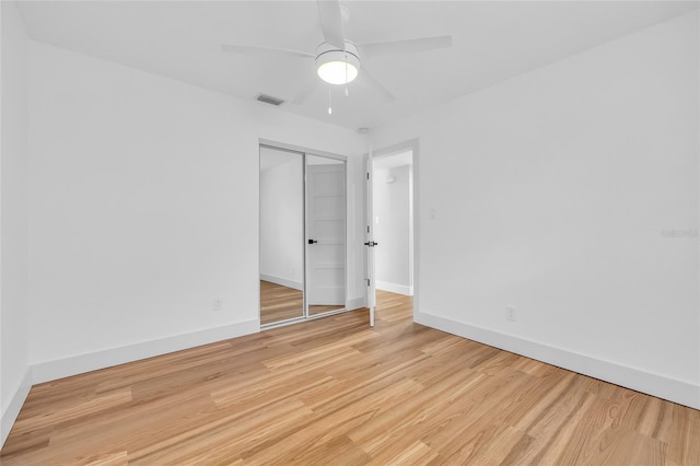 1842 Oklahoma Ave NE, Saint Petersburg, FL 33703 - unfurnished bedroom with a closet, visible vents, baseboards, and light wood-style floors