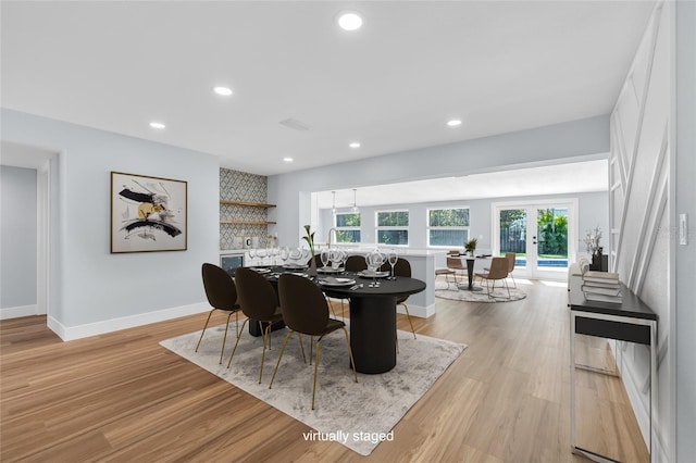 1842 Oklahoma Ave NE, Saint Petersburg, FL 33703 - dining space featuring recessed lighting, light wood-style flooring, and baseboards