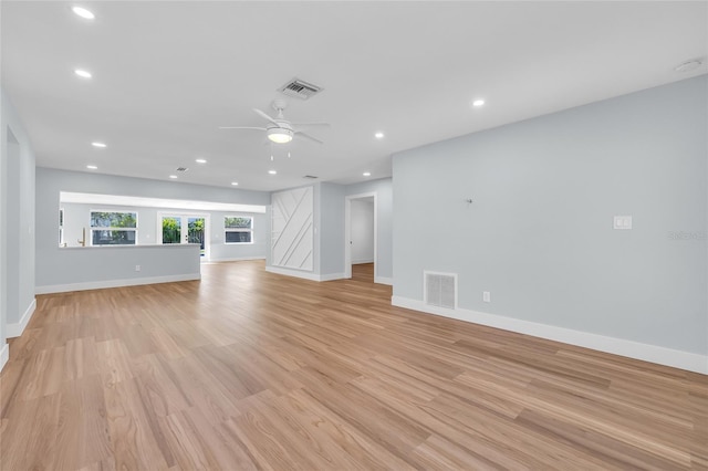 1842 Oklahoma Ave NE, Saint Petersburg, FL 33703 - interior space featuring visible vents, light wood-type flooring, and ceiling fan