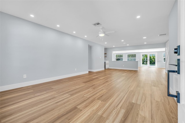 1842 Oklahoma Ave NE, Saint Petersburg, FL 33703 - unfurnished living room featuring visible vents, a ceiling fan, recessed lighting, light wood finished floors, and baseboards