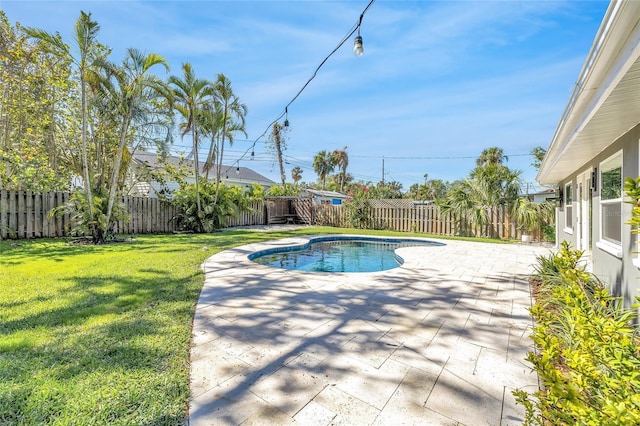 1842 Oklahoma Ave NE, Saint Petersburg, FL 33703 - view of swimming pool featuring a yard, a fenced in pool, a fenced backyard, and a patio area