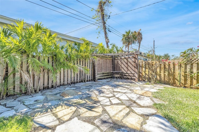 1842 Oklahoma Ave NE, Saint Petersburg, FL 33703 - exterior space featuring a patio area and fence