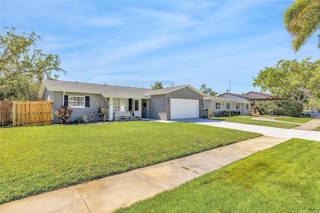 1842 Oklahoma Ave NE, Saint Petersburg, FL 33703 - ranch-style house with a garage and concrete driveway