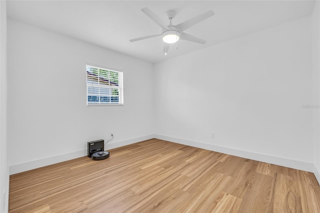 1842 Oklahoma Ave NE, Saint Petersburg, FL 33703 - empty room featuring light wood-style flooring and a ceiling fan