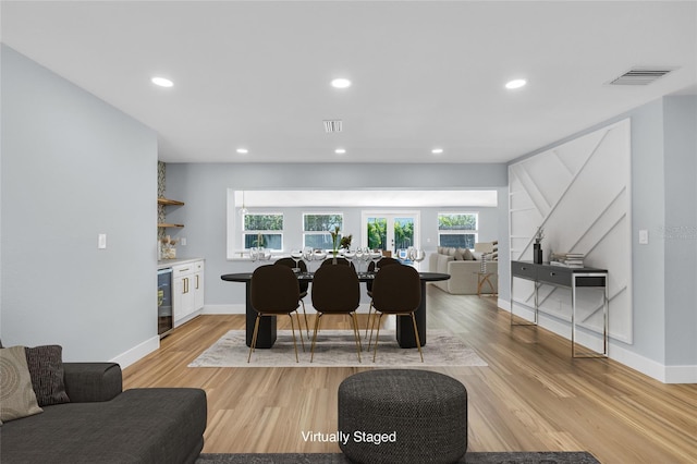 1842 Oklahoma Ave NE, Saint Petersburg, FL 33703 - living area featuring beverage cooler, recessed lighting, and light wood-style flooring
