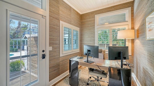 office space featuring ornamental molding and baseboards