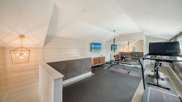 exercise area with vaulted ceiling