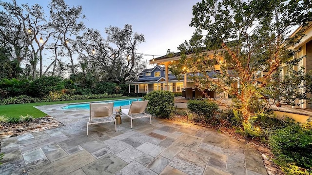 pool with a patio