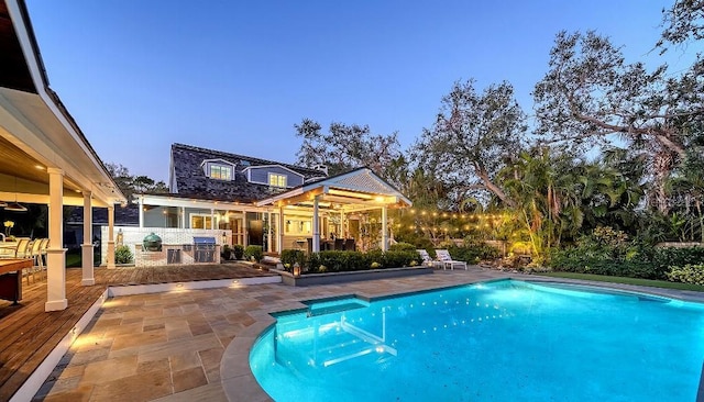 outdoor pool featuring a patio area