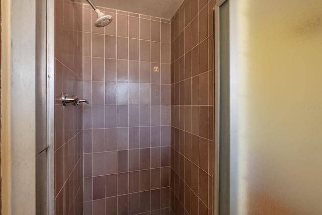 bathroom featuring a stall shower