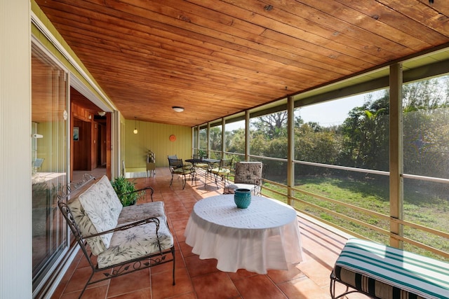 sunroom / solarium with wood ceiling