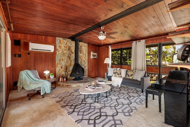 living area with a wall mounted AC, carpet, wooden ceiling, wood walls, and a wood stove