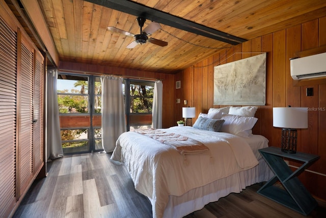 bedroom with a wall unit AC, access to outside, wood finished floors, and wood ceiling