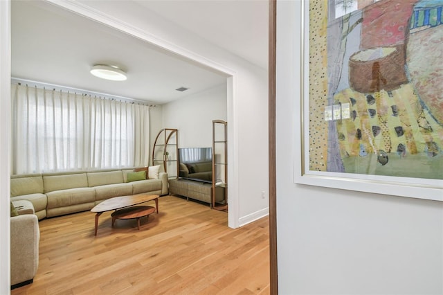 4012 W Morrison Ave, Tampa, FL 33629 - living area featuring visible vents, baseboards, and wood finished floors