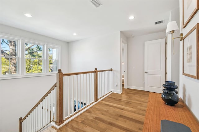 4012 W Morrison Ave, Tampa, FL 33629 - hallway with recessed lighting, an upstairs landing, light wood-style floors, and visible vents