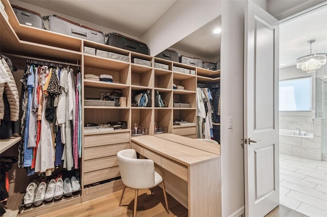 4012 W Morrison Ave, Tampa, FL 33629 - walk in closet with a notable chandelier