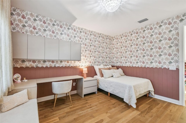 4012 W Morrison Ave, Tampa, FL 33629 - bedroom featuring visible vents, light wood-type flooring, and baseboards