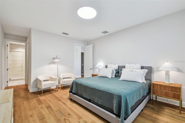 4012 W Morrison Ave, Tampa, FL 33629 - bedroom with light wood finished floors, visible vents, and baseboards