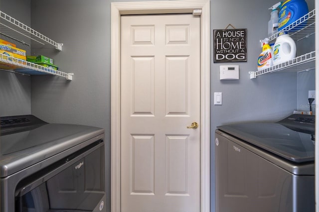 washroom with laundry area and separate washer and dryer