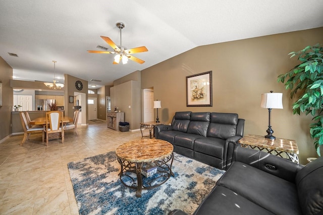 living room featuring baseboards, visible vents, vaulted ceiling, and a ceiling fan