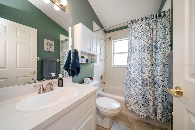 full bathroom with toilet, lofted ceiling, tile patterned floors, shower / bath combo with shower curtain, and vanity