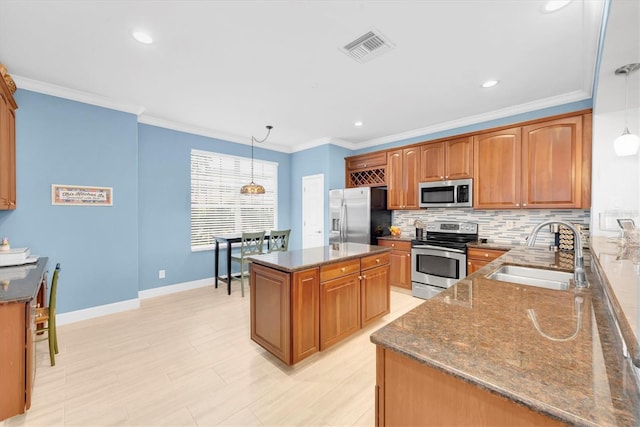 kitchen featuring stainless steel appliances, decorative backsplash, ornamental molding, a sink, and dark stone counters