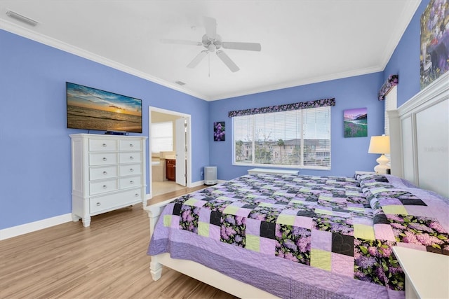 bedroom with crown molding, visible vents, a ceiling fan, wood finished floors, and baseboards