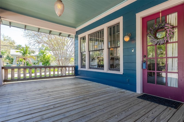 wooden terrace featuring a porch