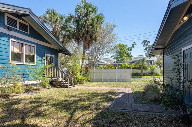 view of yard featuring fence