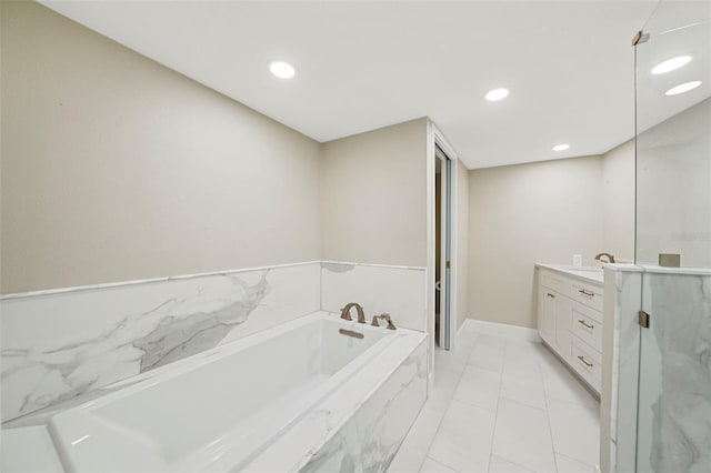 bathroom featuring tile patterned floors, a stall shower, recessed lighting, a bath, and vanity