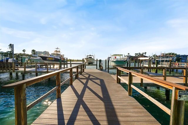 view of dock featuring a water view and boat lift