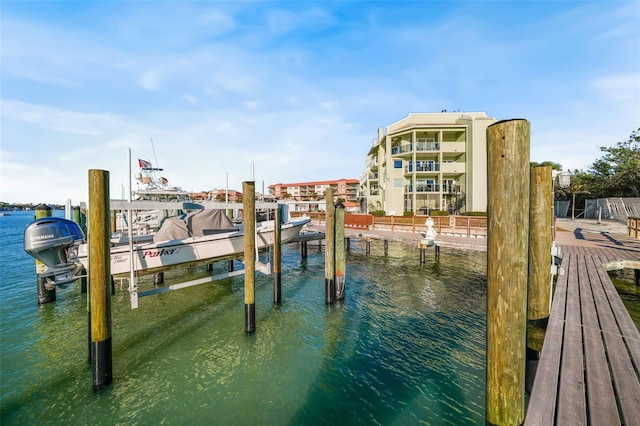 dock area featuring a water view and boat lift