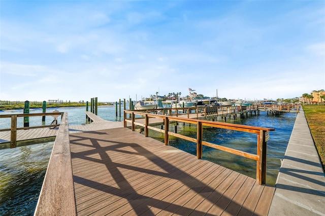 view of dock with a water view and boat lift