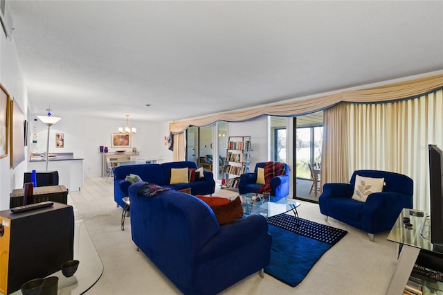 living room with carpet flooring and a notable chandelier